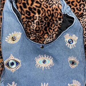 Blue Denim Shoulder Bag with Eye Motifs